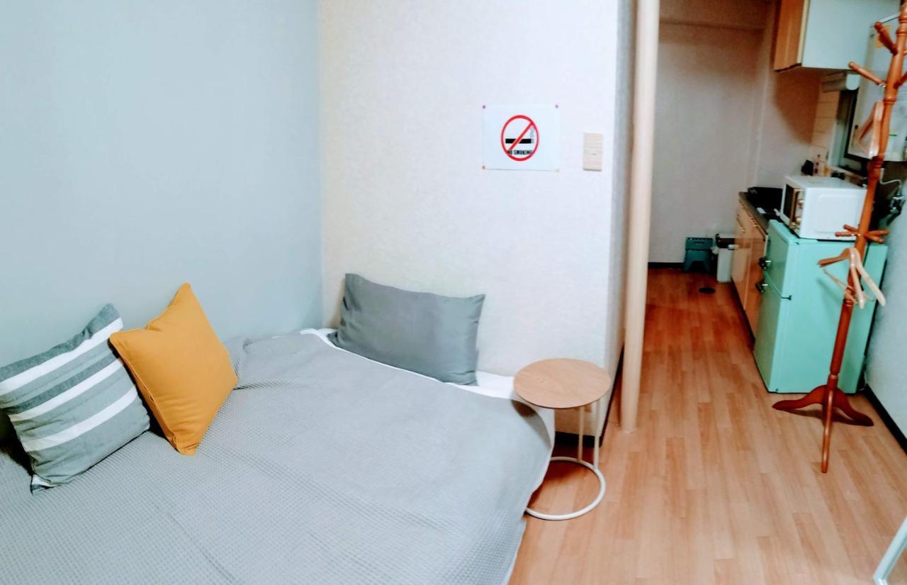 Апартаменты Luxes Hiroshima2F ラクセス ヒロシマ2F Экстерьер фото