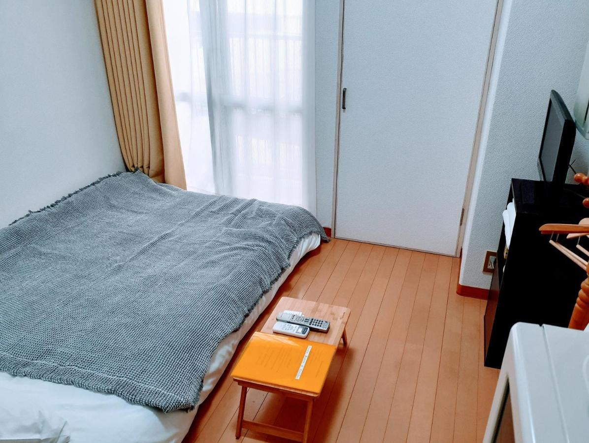 Апартаменты Luxes Hiroshima2F ラクセス ヒロシマ2F Экстерьер фото